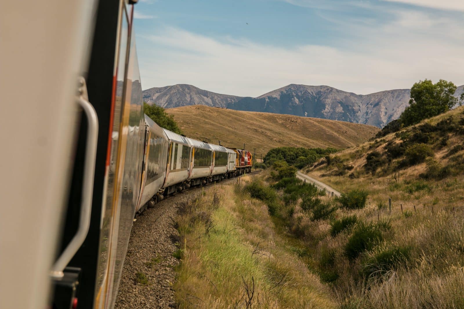 Photo by Josh Nezon on Unsplash. Train, landscape, valley