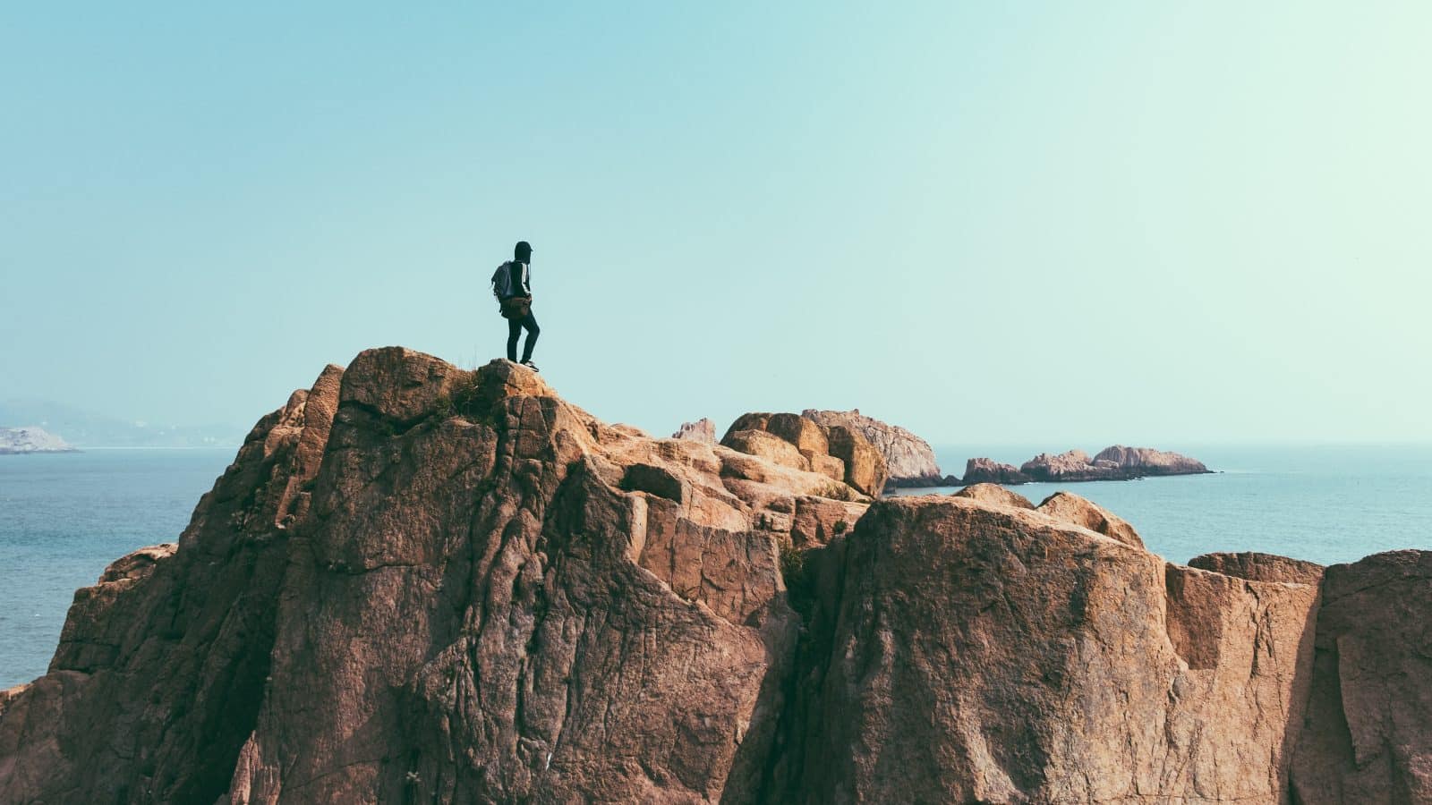 Photo by Wu Jianxiong on Unsplash. Explore, Wander, mountain, ocean, male, guy