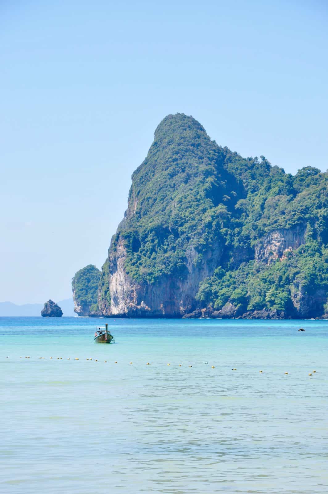 Photo by Alex Block on Unsplash. Phuket, Thailand, beach, water, ocean, sea, blue, boat, island