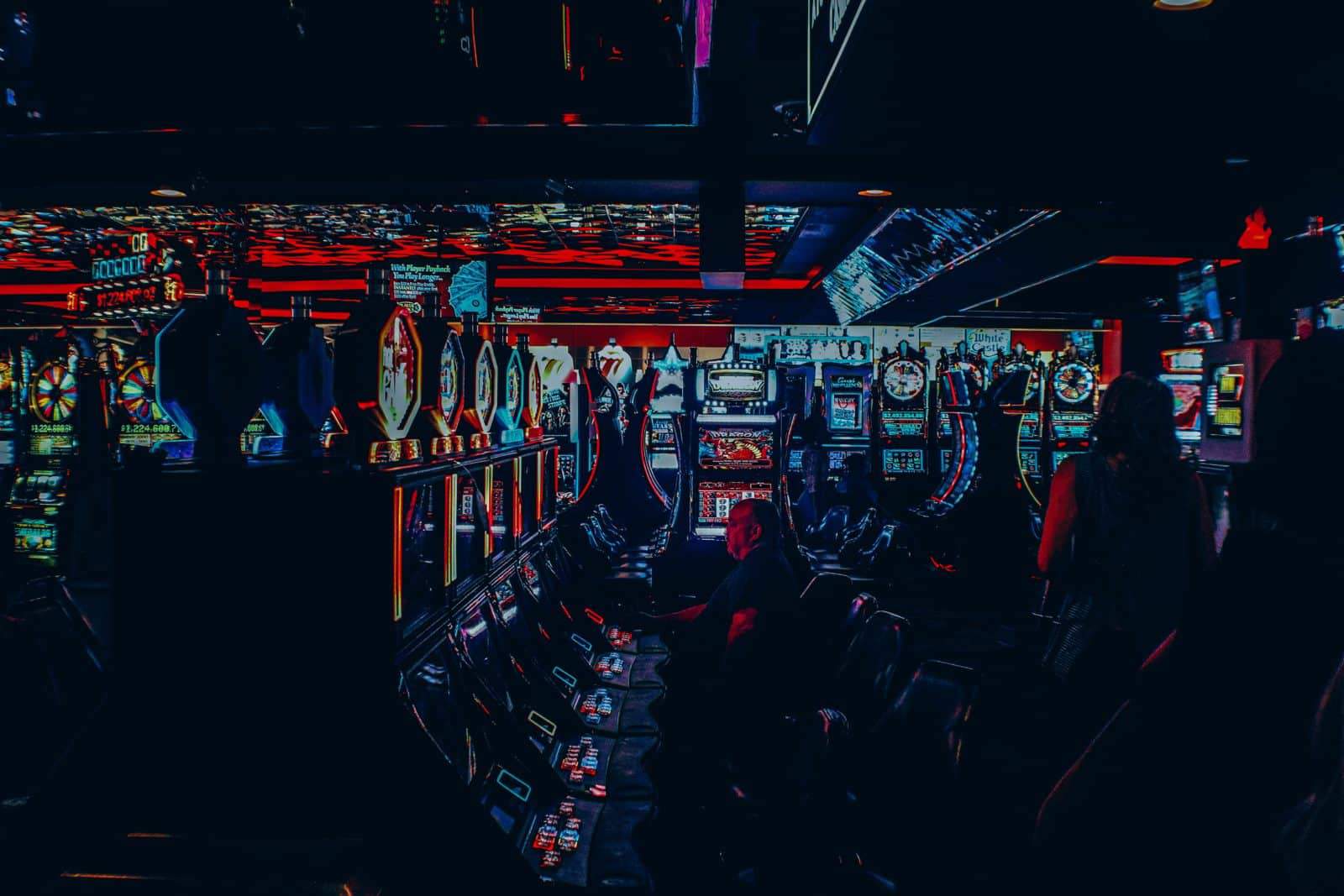 Photo by John Schnobrich on Unsplash. Las Vegas, Vegas strip, gambling, casino, neon lights, sin city
