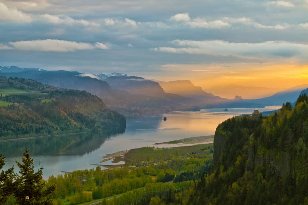 Sunrise over Vista House on Crown Point at Columbia River Gorge.
