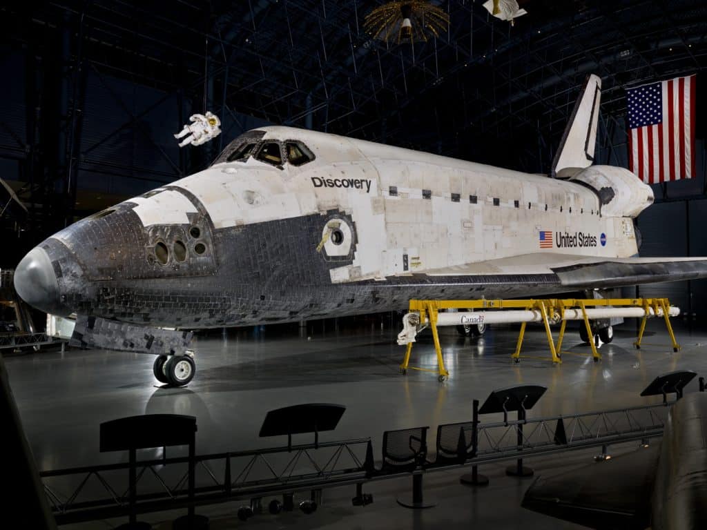 Space Shuttle Discovery on display in the James S. McDonnell Space Hangar at the National Air and Space Museum's Steven F. Udvar-Hazy Center.