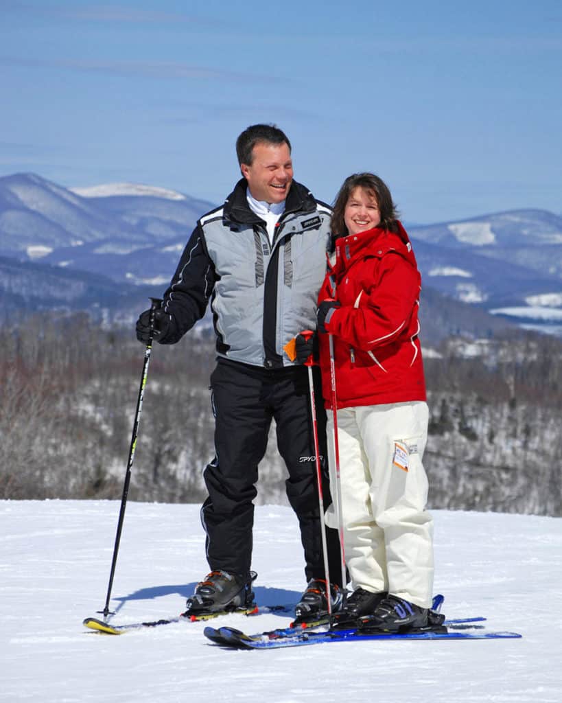 Couple skiing at the Appalachian Mountain Ski Resort, in Boone, North Carolina 