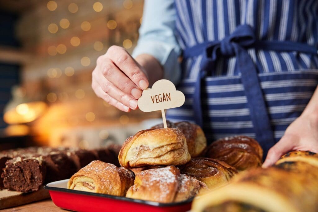A baker with vegan pastries.