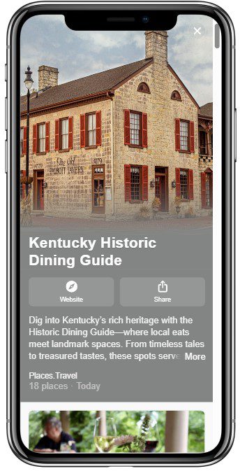 A smartphone screen displays an article titled Kentucky Historic Dining Guide with an image of a rustic stone building and outdoor seating, promoting local historic eateries in Kentucky.