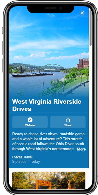 A smartphone displays an article titled West Virginia Riverside Drives with a scenic photo of a river, bridge, and city buildings in the background, and a brief description of river drives and adventures.