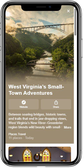 A scenic view of a tall bridge spanning over a lush, green valley with a river below, featured on a smartphone screen promoting West Virginia’s small-town adventures.