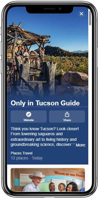 Smartphone displaying a travel guide for Tucson featuring an image of people on a desert observation deck.